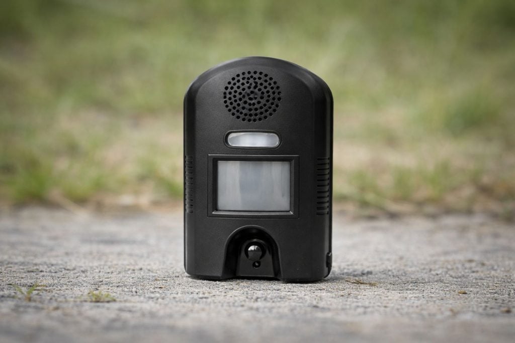 Ultrasonic repeller device for martens and squirrels installed outdoors